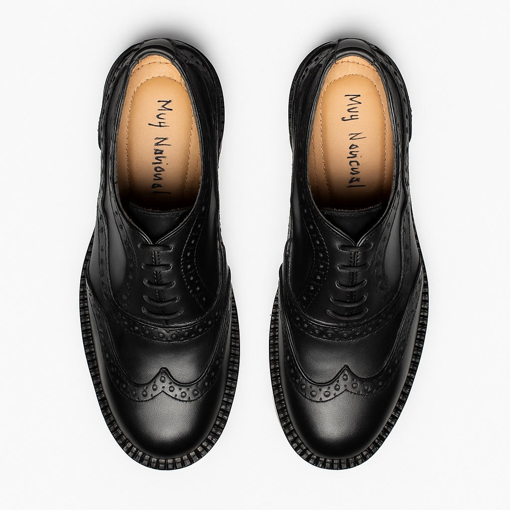 BERZA oxford brogue negro detalle suela ligera hecho a mano México
