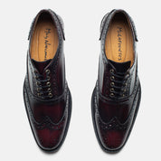 JUNCAL oxford brogue burgundy detalle un oxford que se nota sin exagerar
