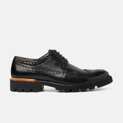 REBOZO brogue negro San Crispino vista frontal edición limitada artesanal
