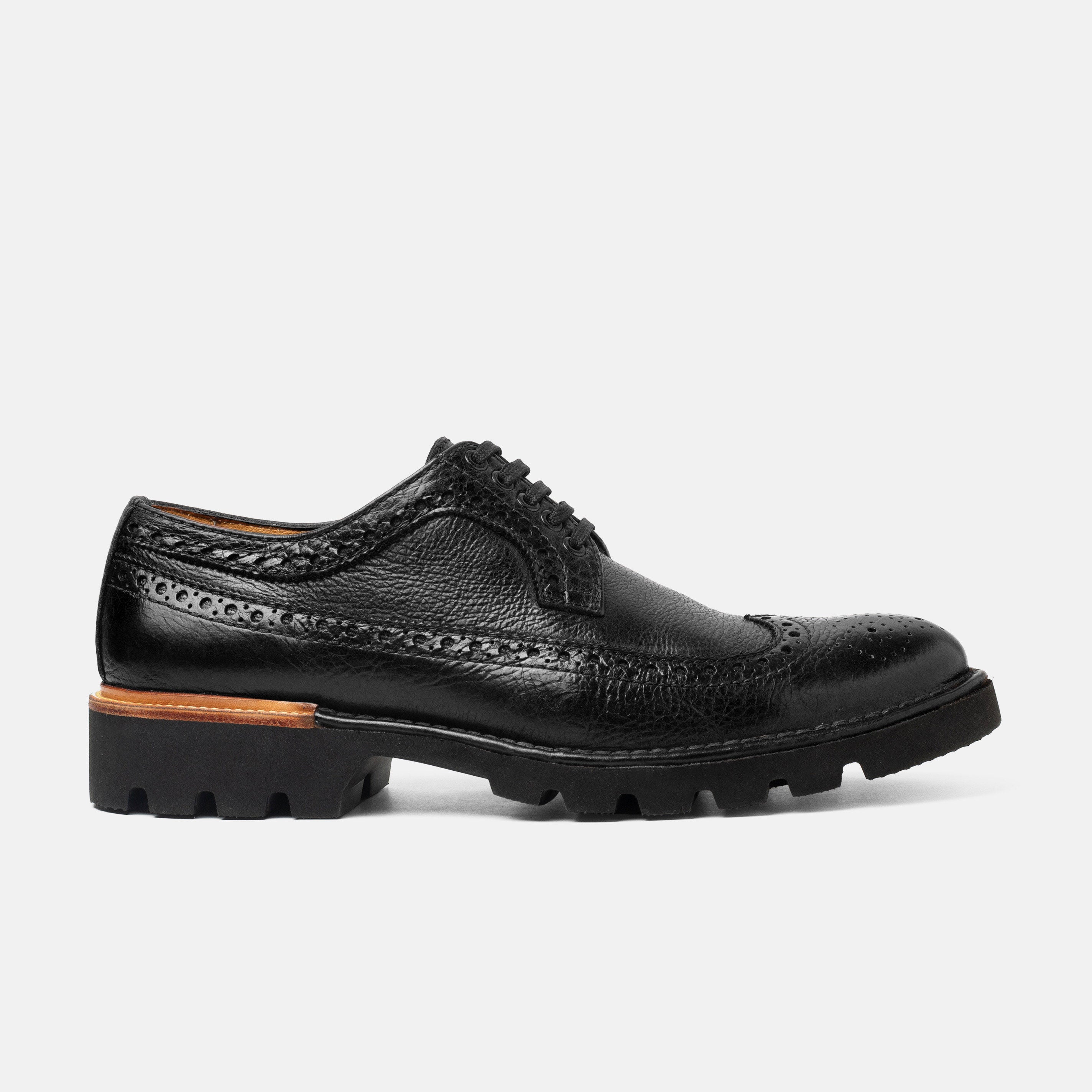 REBOZO brogue negro San Crispino vista frontal edición limitada artesanal
