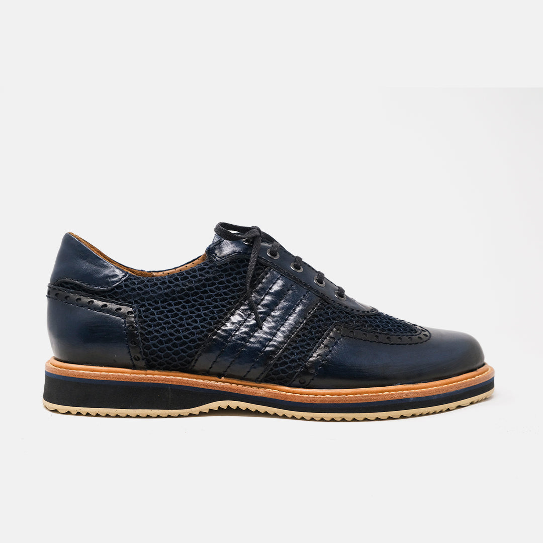 RESETE derby técnico azul navy corte híbrido malla piel vista frontal
