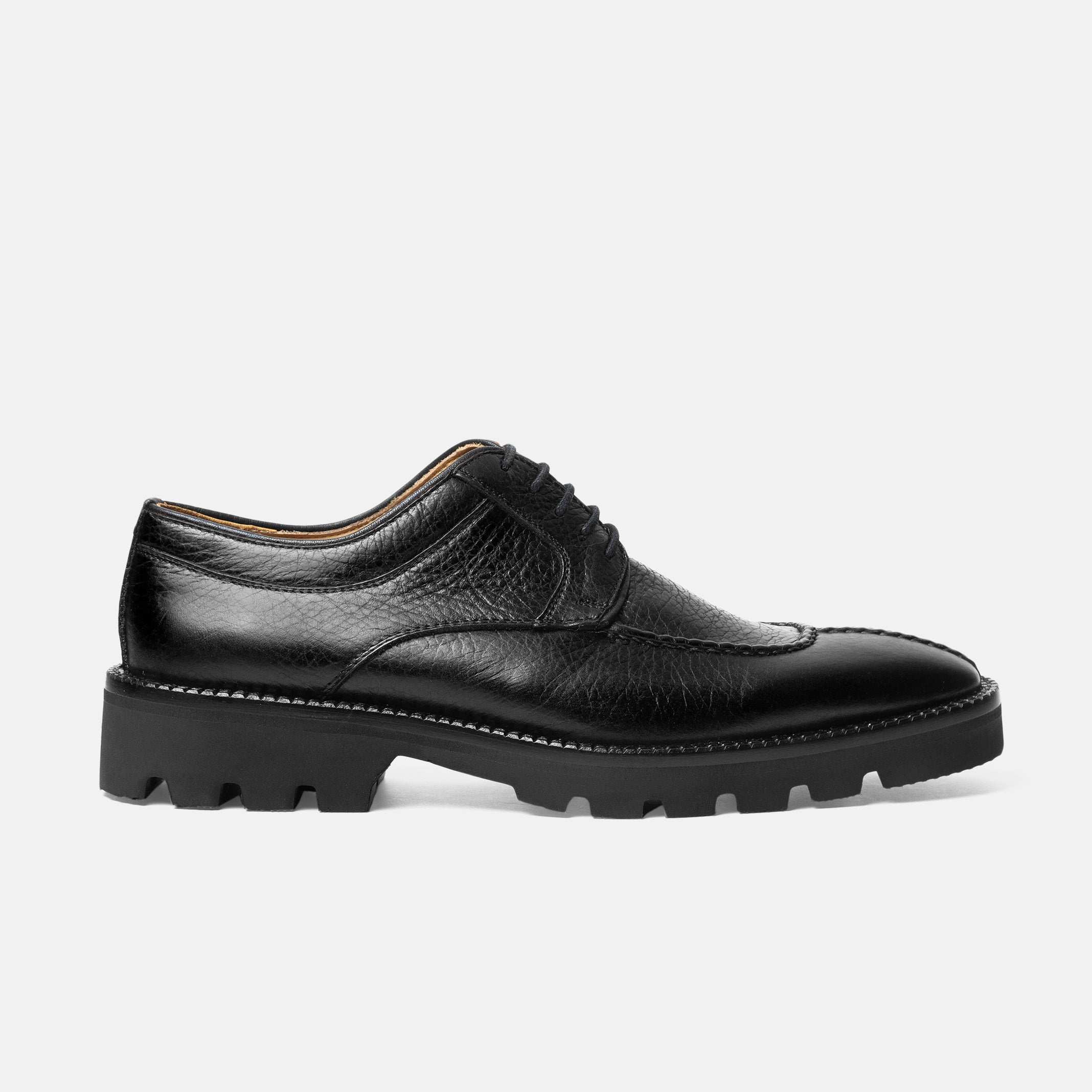 SABRA derby negro bordo tejido a mano vista frontal calzado artesanal
