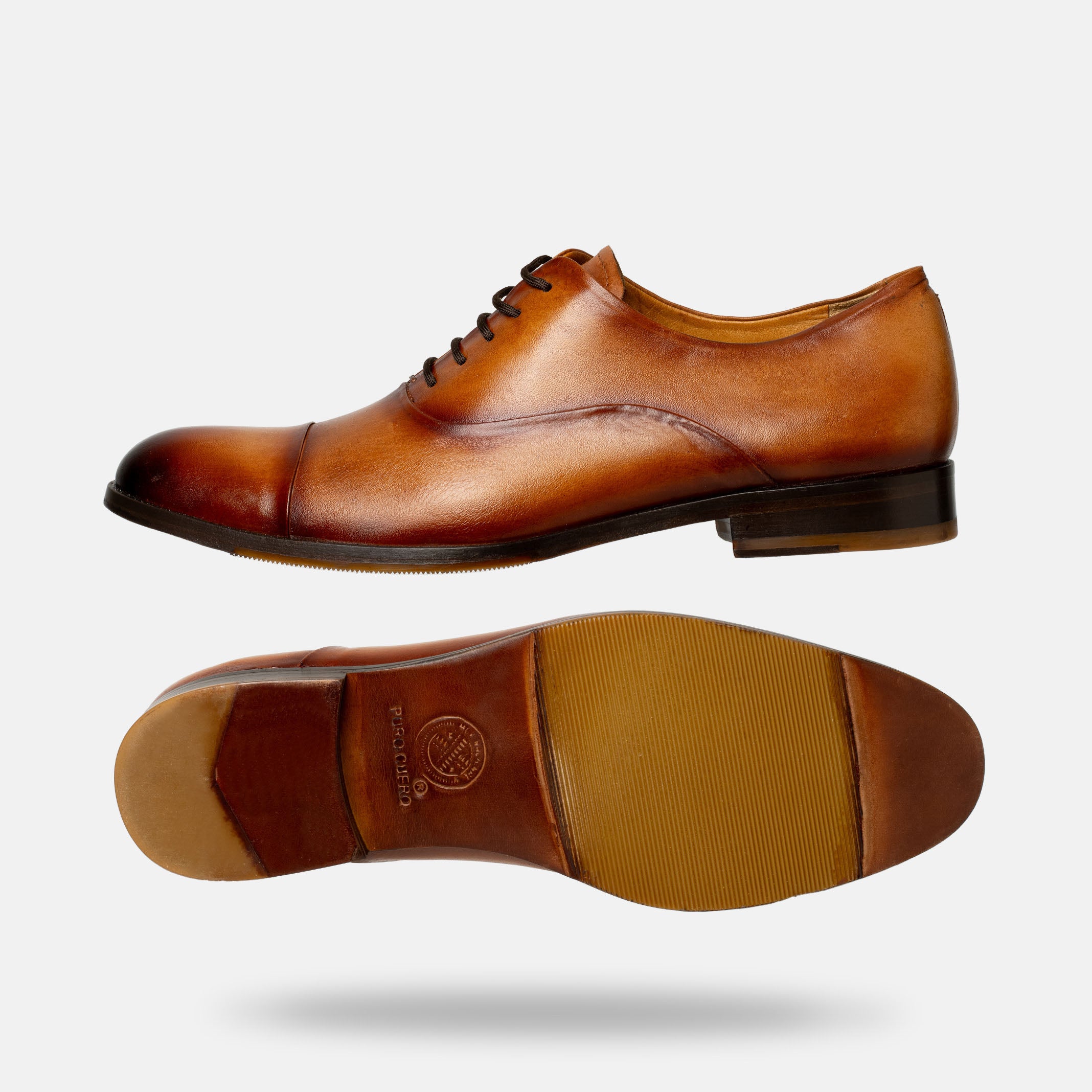 UMAN oxford cap toe caramel detalle lateral construcción artesanal México
