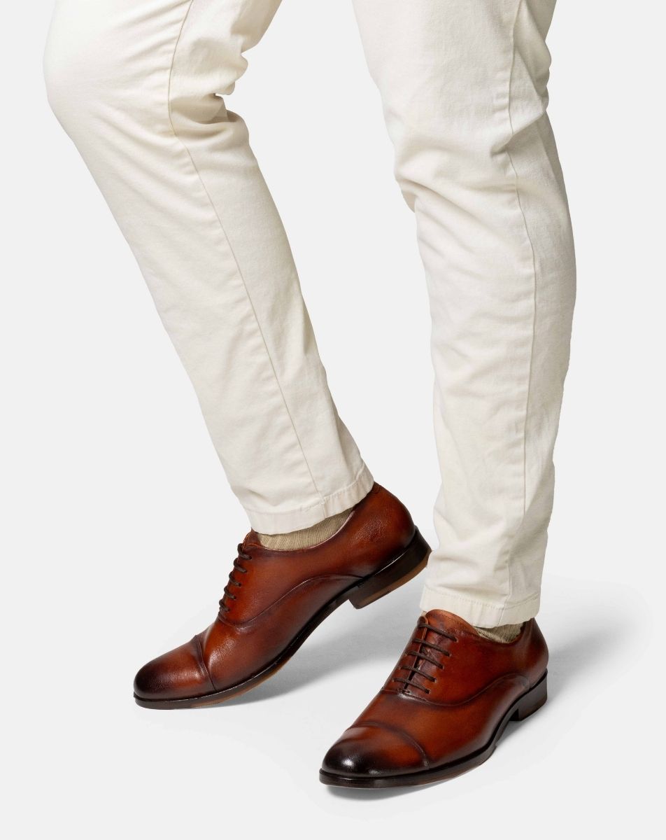 UMAN oxford cap toe london imagen principal elegancia silenciosa artesanal
