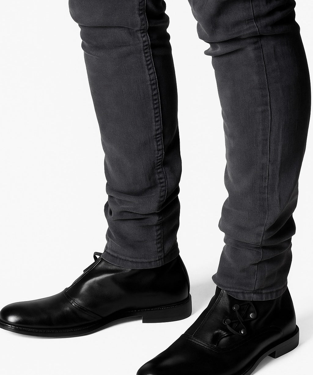 YUTE bota negro vista completa silueta estilizada distinción en cada paso

